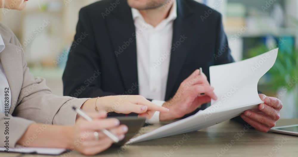 Businessman Discusses Company Financial Report with Colleague Businessman Discusses Company Financial Report with Colleague