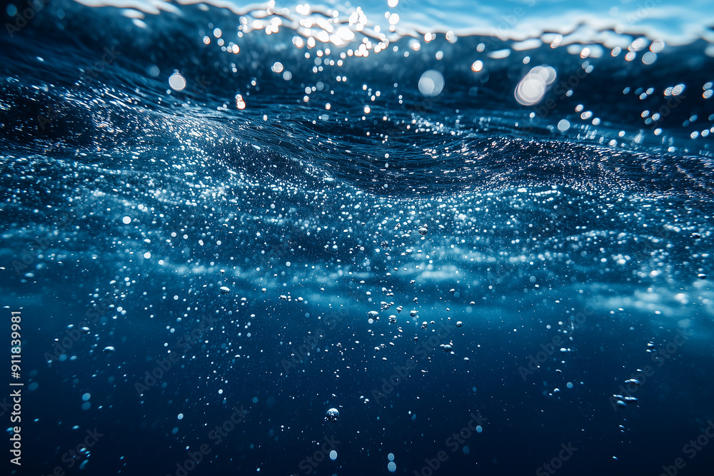 Underwater view with bubbles rising to the surface in a deep blue ocean. The image captures the serenity and mystery of the underwater world Underwater view with bubbles rising to the surface in a deep blue ocean. The image captures the serenity and mystery of the underwater world