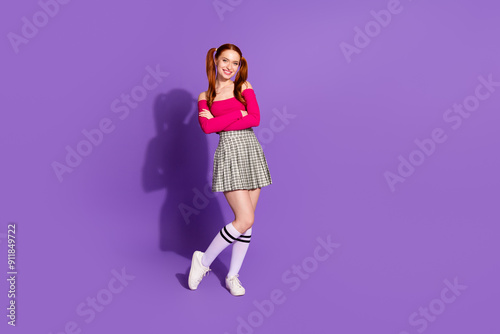 Full length photo of adorable lovely girl wear off shoulders top hands crossed empty space isolated purple color background photo