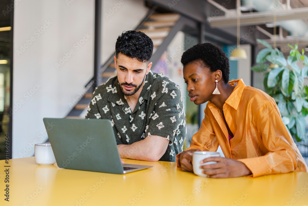Businesspeople Working On Laptop In Modern Workplace Businesspeople Working On Laptop In Modern Workplace