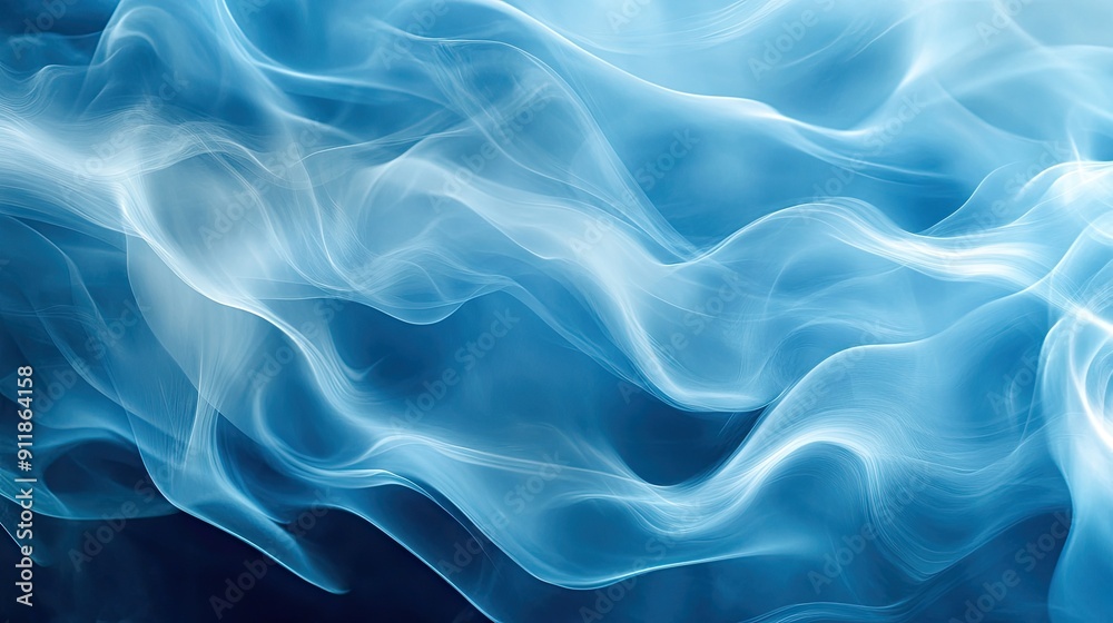 Fluid blue smoke with abstract wave patterns, offering an ethereal and artistic background. Fluid blue smoke with abstract wave patterns, offering an ethereal and artistic background.