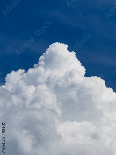 Fluffy white cloud and blue sky
