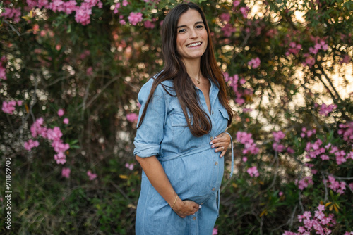 portrait of pregnant woman in spring photo