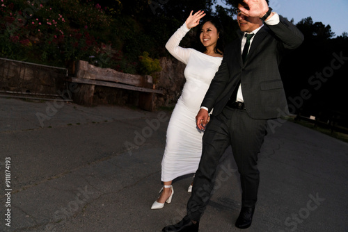 paparazzi style portrait of stylish couple photo