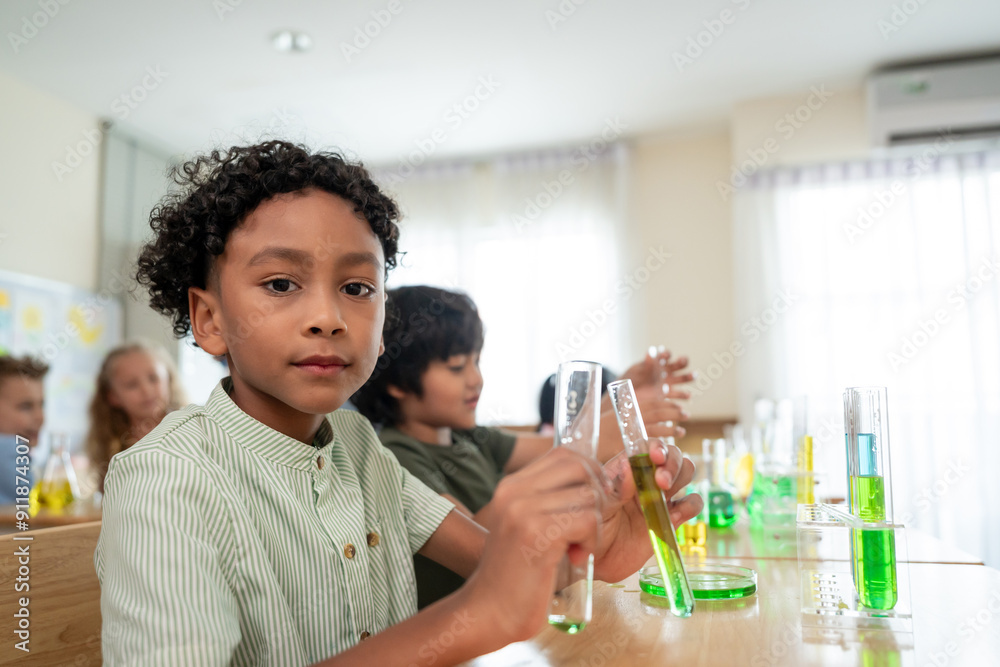 African American student learning in classroom at elementary school. African American student learning in classroom at elementary school.