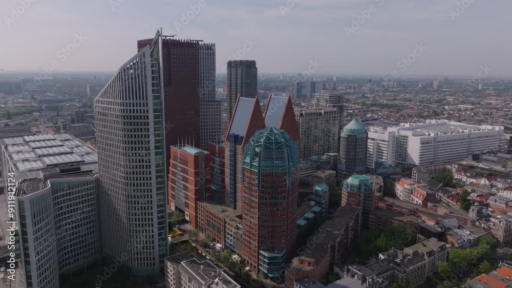 Modern architecture of Hofturm and Zurichturm, in the cityscape of The Hague from above, showcasing distinctive buildings and urban layout Modern architecture of Hofturm and Zurichturm, in the cityscape of The Hague from above, showcasing distinctive buildings and urban layout