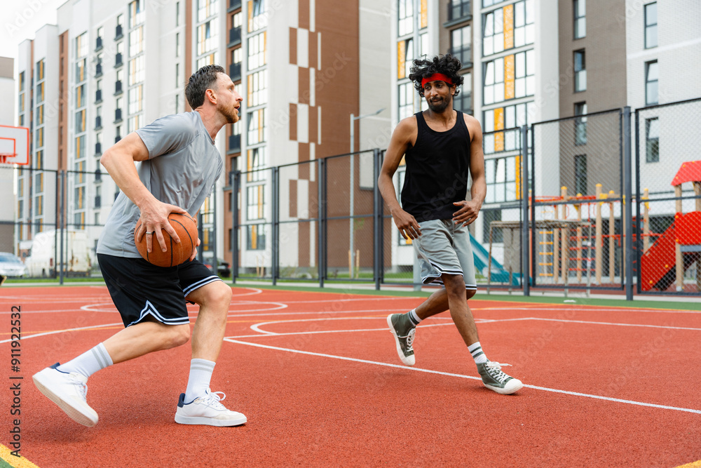 Men play basketball Men play basketball