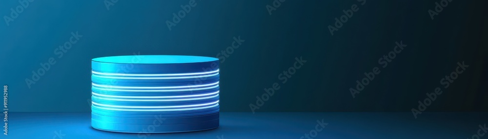 A futuristic blue data cylinder on a dark background, symbolizing technology, data storage, and digital innovation. A futuristic blue data cylinder on a dark background, symbolizing technology, data storage, and digital innovation.