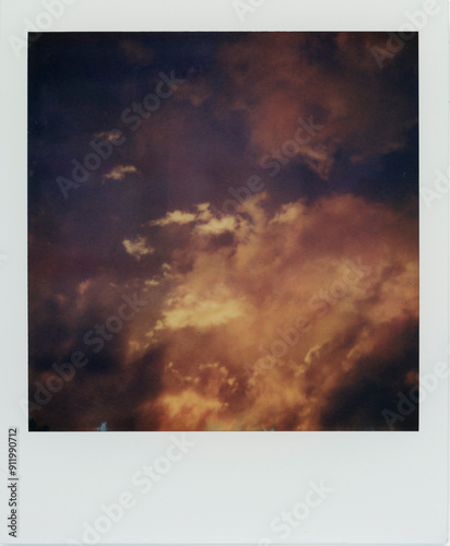 Clouds and bright light on Polaroid photo