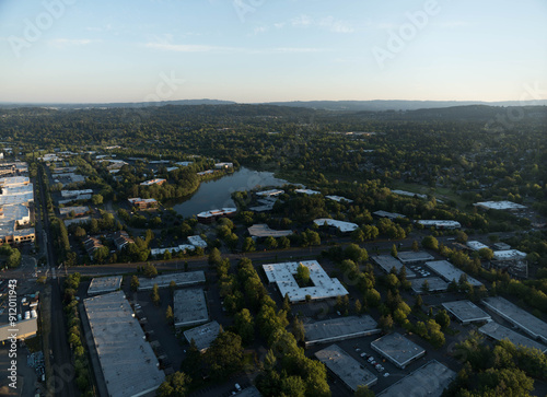 A city view from above with a lake in the background