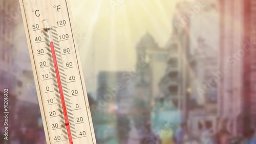 Thermometer and summer in a big city