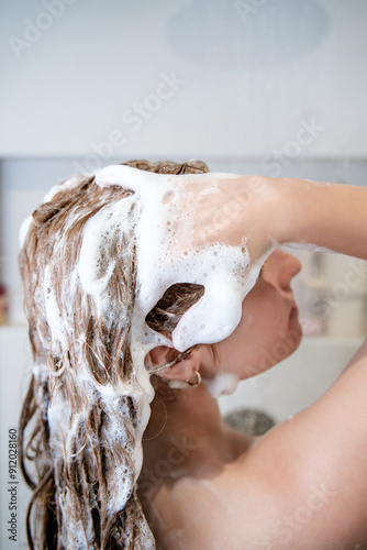 Woman Washing Hair in Shower