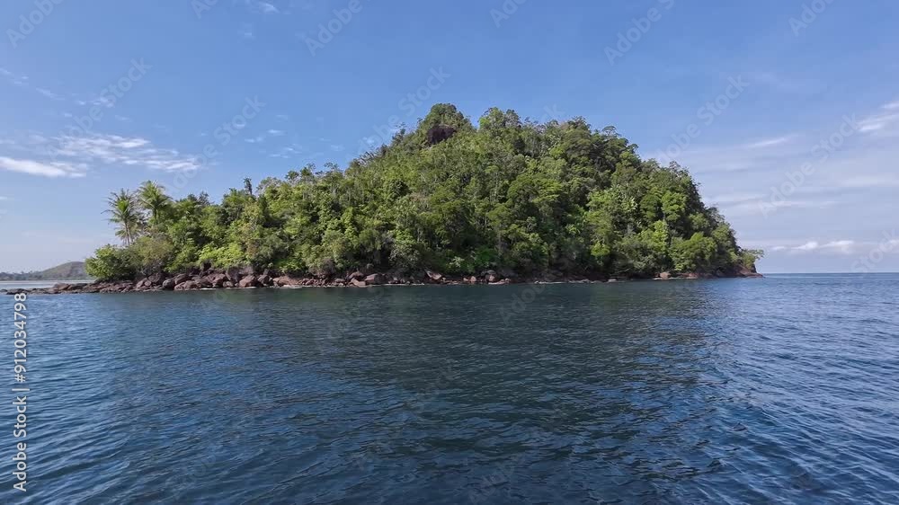 Beautiful landscape, sea and islands. The sky is blue. Moving forward scene. Sironjong Island, Mandeh, Padang, Indonesia