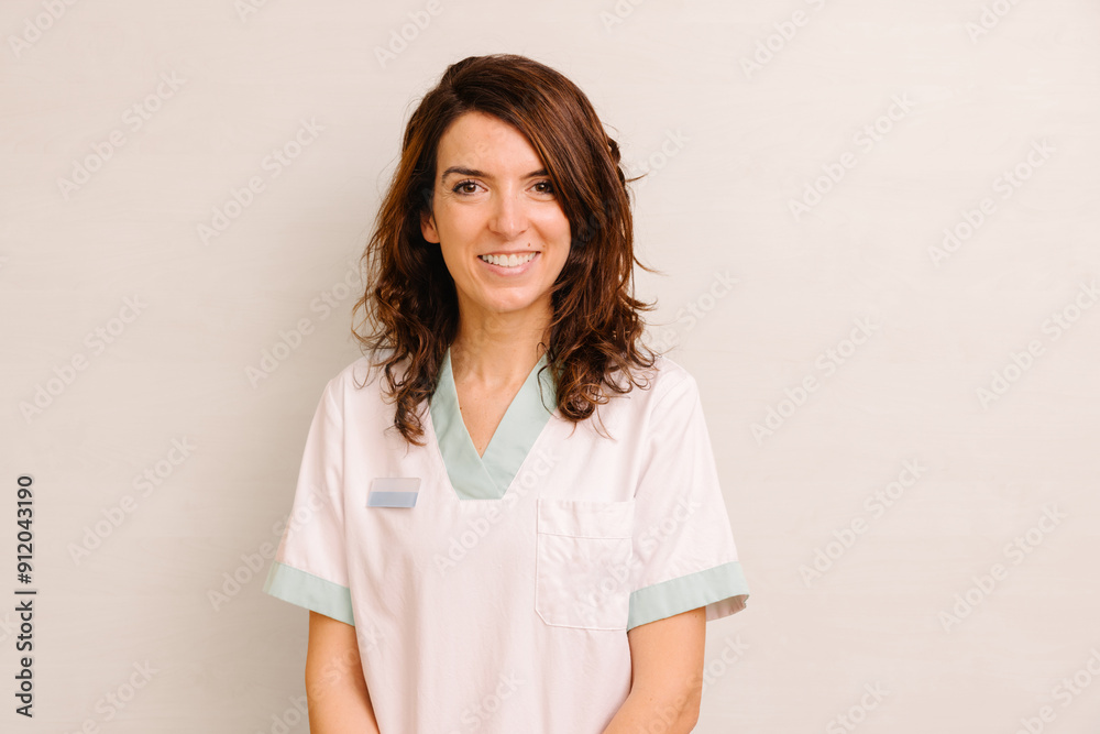 Friendly nurse in white uniform with light green details Friendly nurse in white uniform with light green details