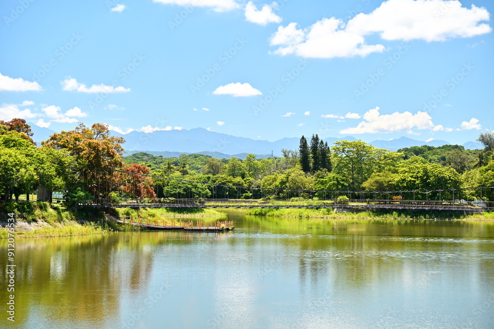 Hutoupi Reservoir in Tainan's Xinhua District is Taiwan's first reservoir, offering a rich blend of history, culture, and natural beauty with activities like lake strolling and boating.