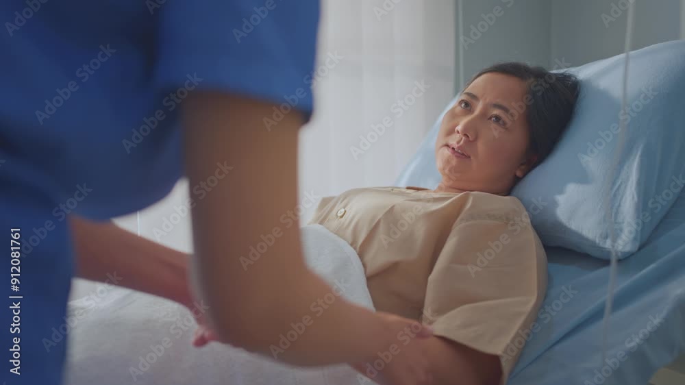 Asian caregiver nurse examine senior female patient in hospital ward. Asian caregiver nurse examine senior female patient in hospital ward.