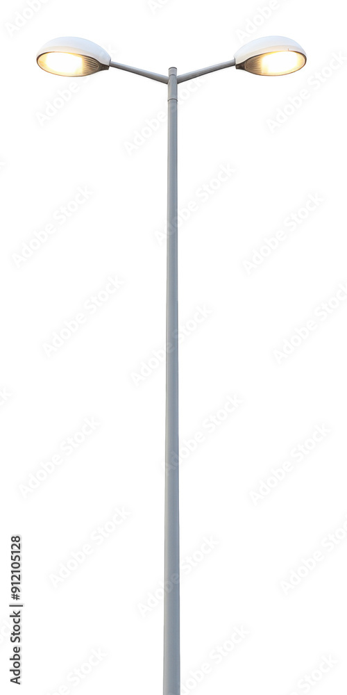 A tall street lamp illuminating a pathway at night, showcasing modern design and bright light for safety and visibility. A tall street lamp illuminating a pathway at night, showcasing modern design and bright light for safety and visibility.