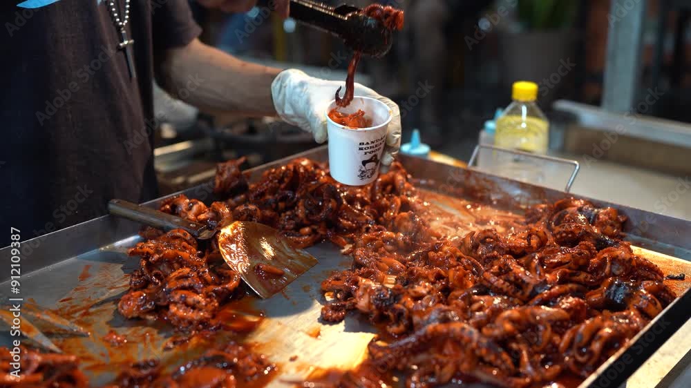 Cooking Grilled Squid at street food market night