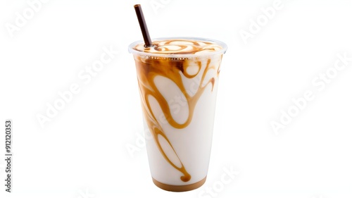 Iced caramel macchiato in a plastic cup, showing the beautiful swirls of coffee, milk, and caramel isolated