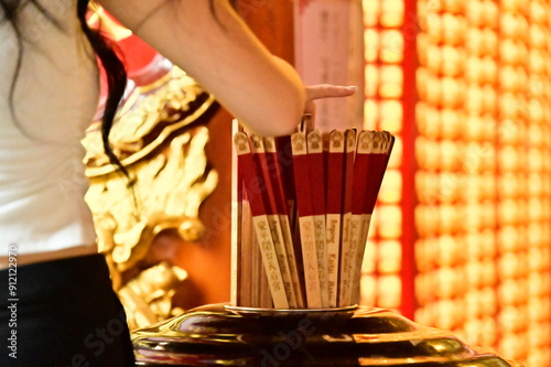 Taiwan - Jul 09, 2024: Close-up of divination tubes at Anping Kaitai Tianhou Temple, where worshippers seek spiritual guidance through fortune-telling and divine communication.