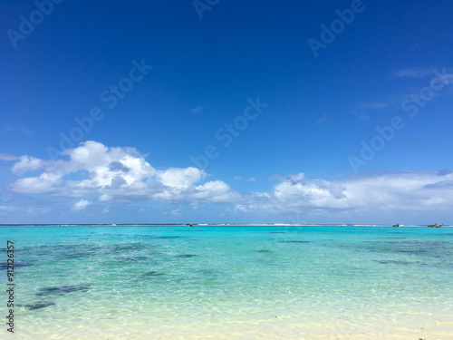 beach with blue sky and clouds  Cook Islands