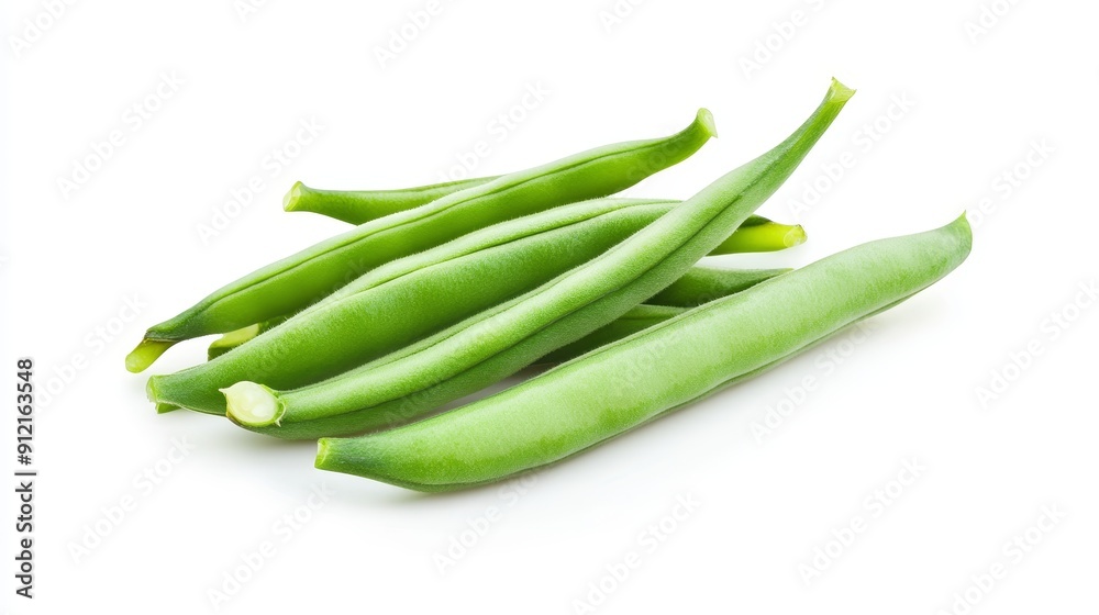 Fresh eggplant halved lengthwise, revealing its pale flesh and small seeds. The glossy purple skin contrasts sharply against a white background Fresh eggplant halved lengthwise, revealing its pale flesh and small seeds. The glossy purple skin contrasts sharply against a white background