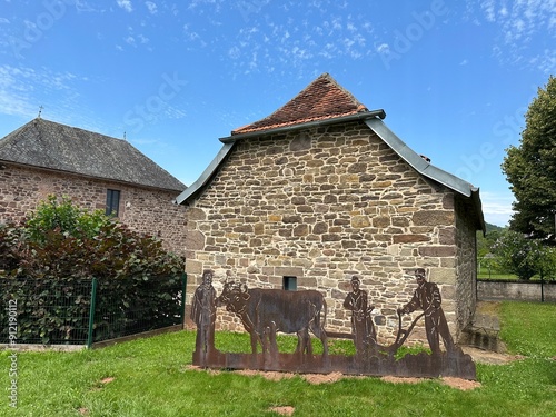 sculpture de travaux agricoles en fer forgé