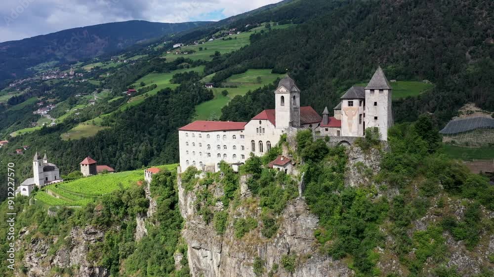 Aerial view of Castle on the rock, vineyards and winery on a sunny summer day Bolzano Italy Aerial view of Castle on the rock, vineyards and winery on a sunny summer day Bolzano Italy