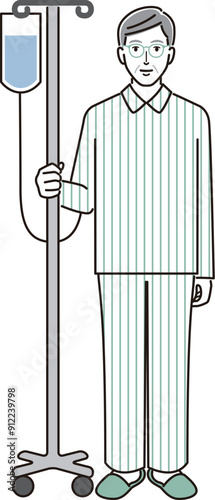 点滴を受けている高齢男性