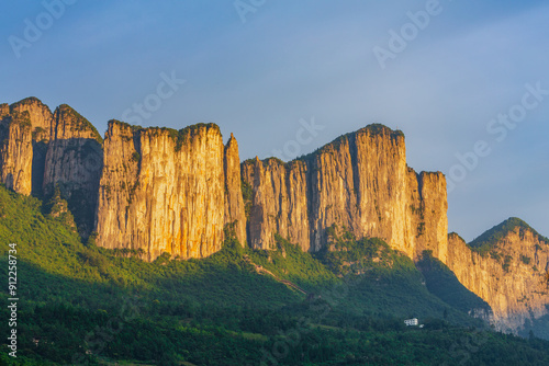 Landscape with steep limestone karst cliffss at sunset, Enshi Grand Canyon National Park, Hubei province China
 photo