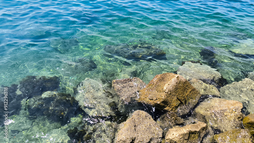 Obraz na płótnie Adriatic sea surface with pebbles and stones