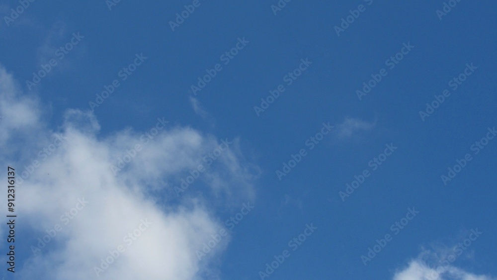 Blue sky background. sky and white clouds. warm weather. Blue sky background. sky and white clouds. warm weather.