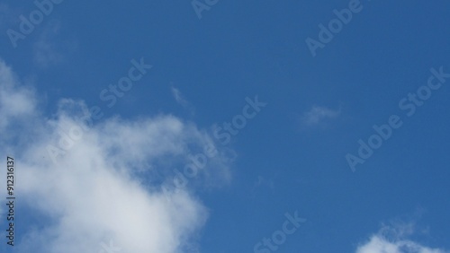 Blue sky background. sky and white clouds. warm weather.