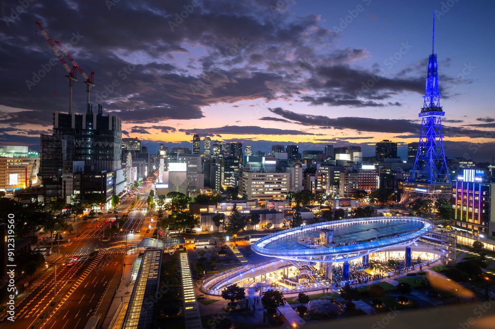 sunset or sun rise of Nagooya cityscape with Nagoya TV Tower and Oasis 21, office building and downtown with Skyline twilight sky in summer season, Nagoya city, Aichi, Japan