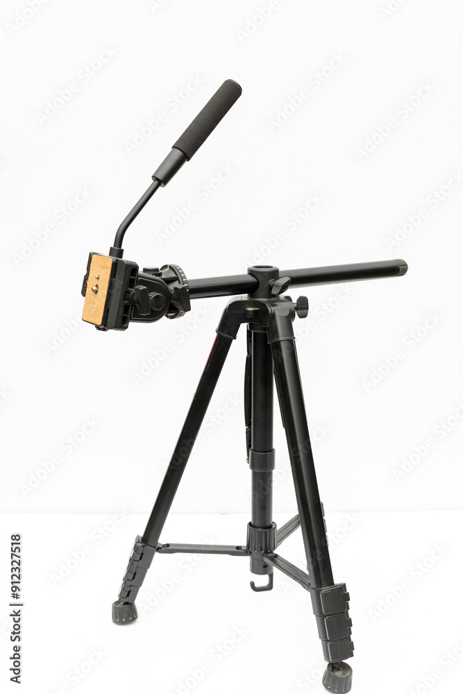 Professional tripod with fluid head for multi angle video shooting and photography Professional tripod with fluid head for multi angle video shooting and photography
