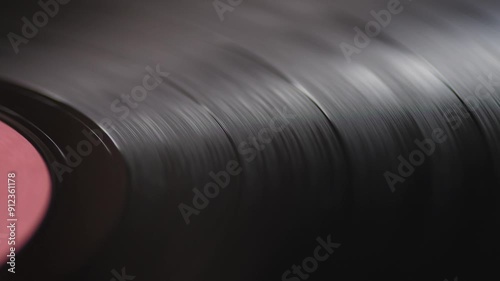 close up vinyl record spinning , retro vinyl record in turntable macro