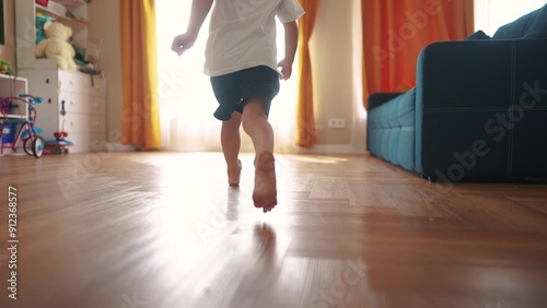 Bare feet run. child is running indoors at home. Children happy family mother concept. kid family is running outside while playing indoors. Child son fun running down bare feet happy childhood.