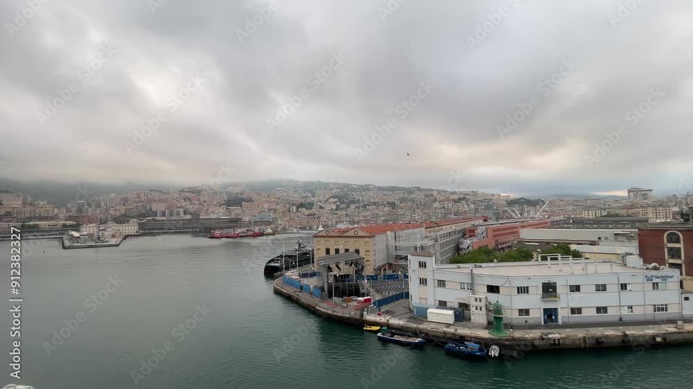 cloud storm approaching the city of Genoa, Italy aerial established footage above the port cloud storm approaching the city of Genoa, Italy aerial established footage above the port