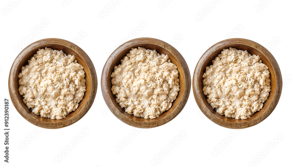 Set of bowl of oats porridge isolated on white background. Top view Set of bowl of oats porridge isolated on white background. Top view