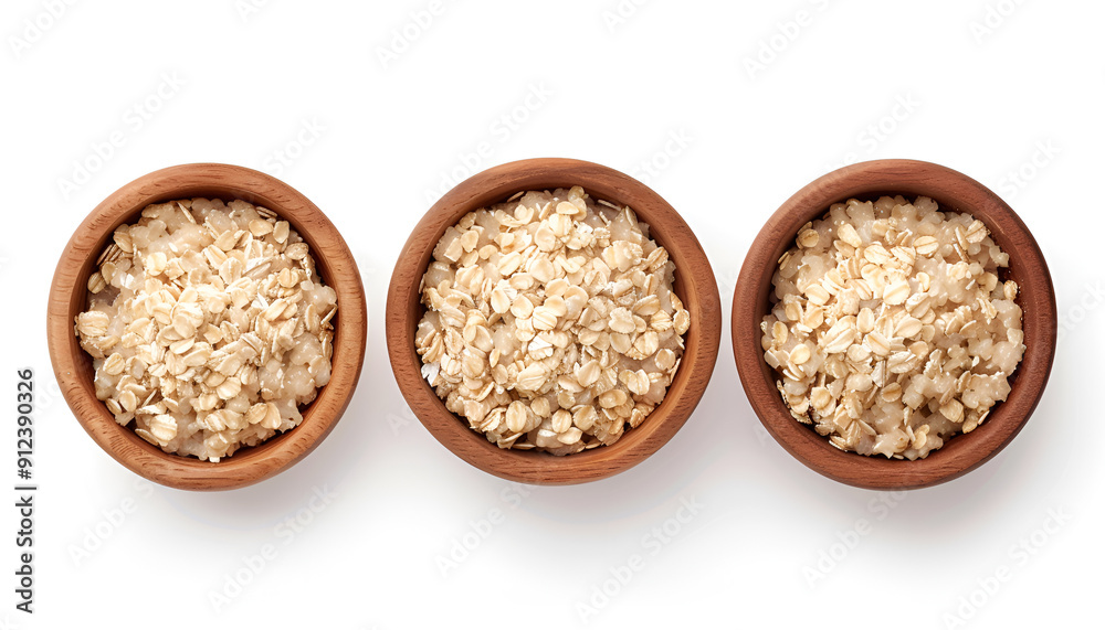 Set of bowl of oats porridge isolated on white background. Top view Set of bowl of oats porridge isolated on white background. Top view