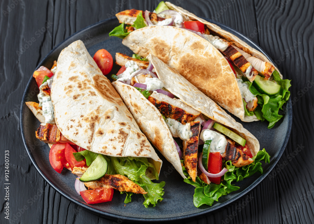 grilled chicken street tacos on a dark plate grilled chicken street tacos on a dark plate