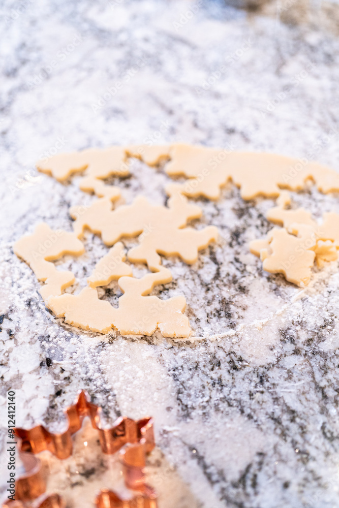 Baking Snowflake-Shaped Sugar Cookies for Homemade Christmas Gifts Baking Snowflake-Shaped Sugar Cookies for Homemade Christmas Gifts