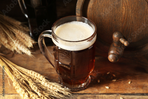 Wooden barrel and mug of co...