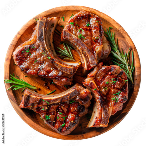 Lamb chops in a plate isolated on a white or transparent background. Spanish style lamb chops in a wooden plate. Traditional Spanish dish. Top view. photo