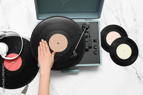 Woman with vinyl disks and ...