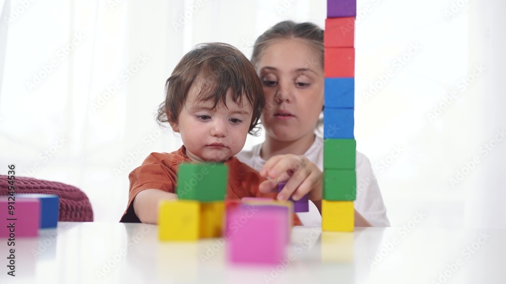child baby group playing cubes close-up. education a children development of fine motor skills concept. child baby group lifestyle close-up hands plays with blocks develops fine motor skills child baby group playing cubes close-up. education a children development of fine motor skills concept. child baby group lifestyle close-up hands plays with blocks develops fine motor skills
