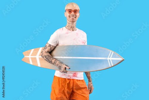 Young tattooed man with sur...