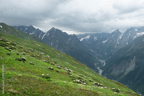 Magnificent mountains to trek in Mestia. Blooming mountain views in snowy weather in Mestia Georgia. Magnificent Mestia mountain views. Koruldi Lake trekking route. photo