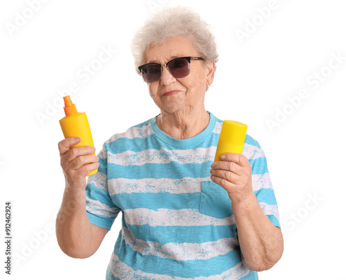 Senior woman with bottles o...