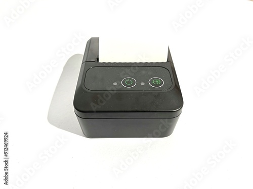 Mini wireless portable thermal printer with charging port, power button and paper roll for printing labels and receipt isolated on white background